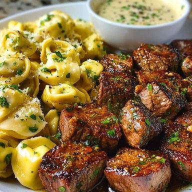 Garlic Butter Steak Bites with Creamy Parmesan Tortellini and Garlic Sauce