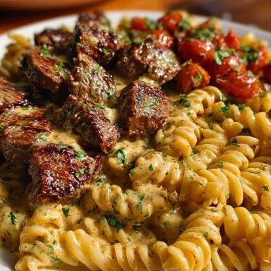 Steak Bites in Garlic Parmesan Sauce over Rotini